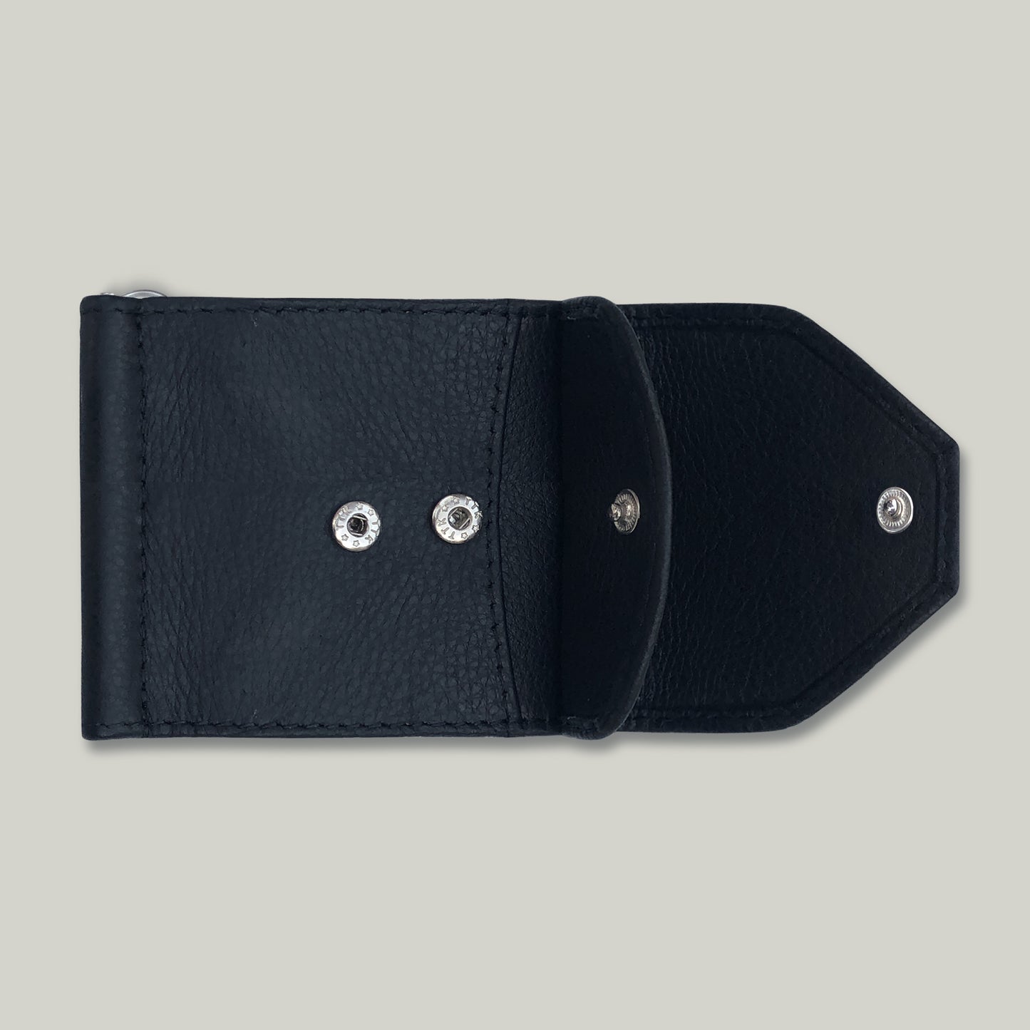 Black leather wallet with silver buttons on a light gray background