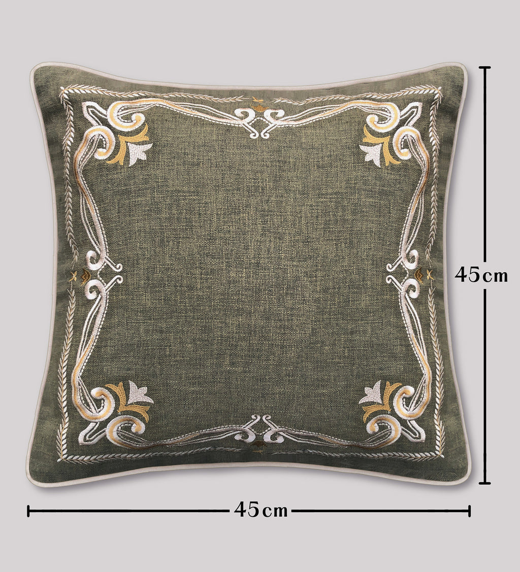 Decorative pillow with embroidered patterns on a gray background