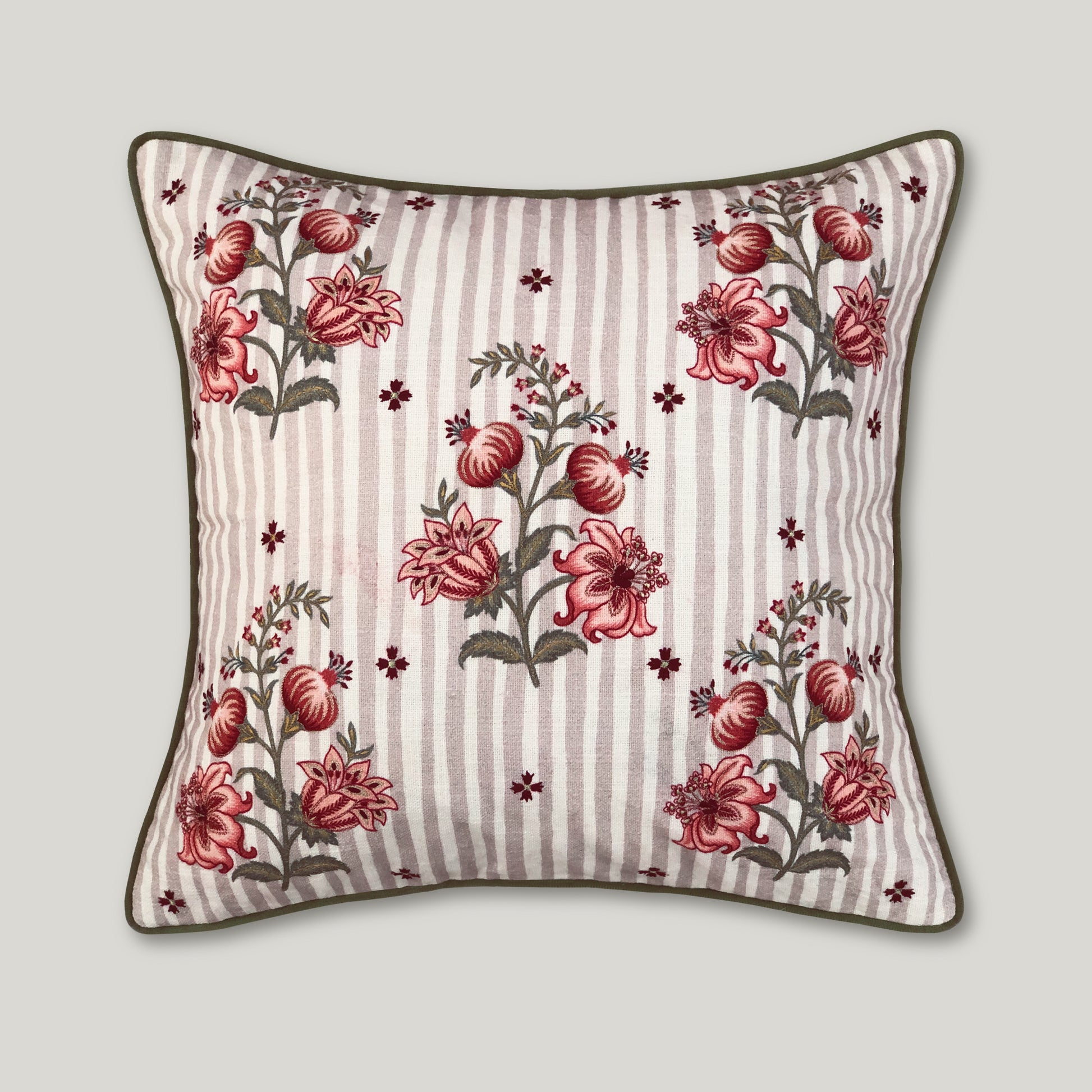 Beige cotton cushion cover featuring intricate, hand-embellished pomegranate embroidery in rich, traditional motifs for a regal heritage aesthetic.