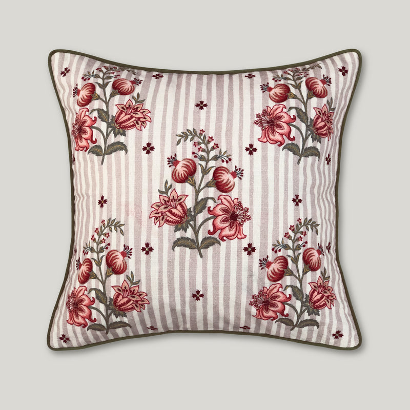 Beige cotton cushion cover featuring intricate, hand-embellished pomegranate embroidery in rich, traditional motifs for a regal heritage aesthetic.