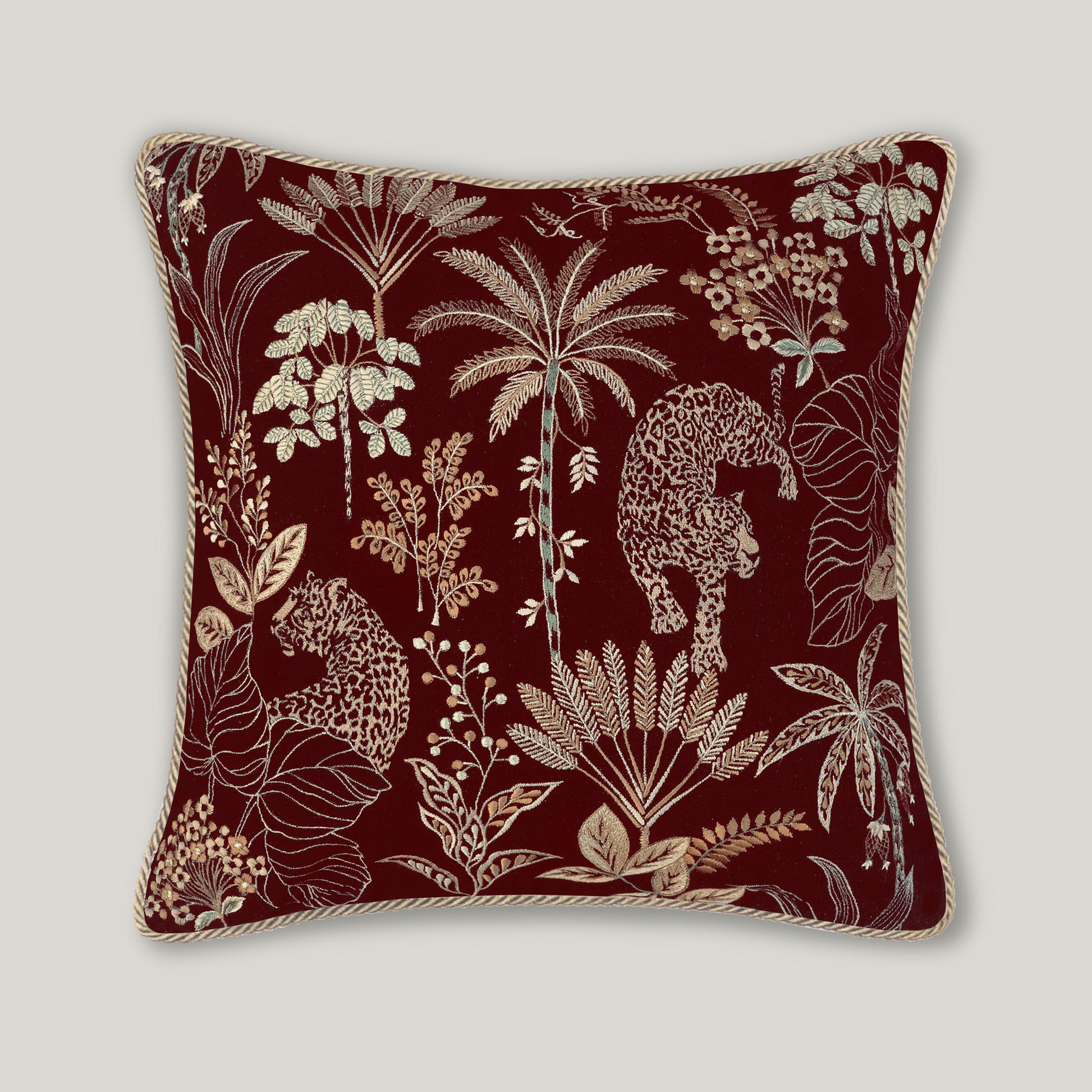 Selva Embroidery Cushion in rich burgundy velvet, featuring detailed decorative embroidery on a luxury wine-colored throw pillow.