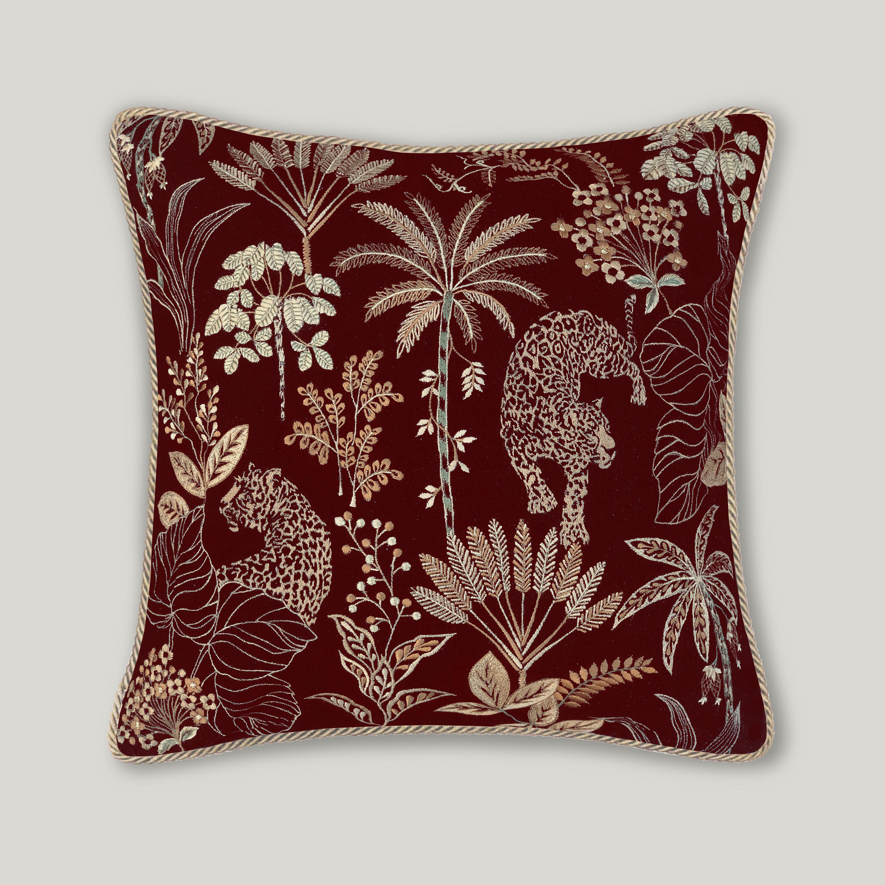 Selva Embroidery Cushion in rich burgundy velvet, featuring detailed decorative embroidery on a luxury wine-colored throw pillow.