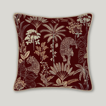 Selva Embroidery Cushion in rich burgundy velvet, featuring detailed decorative embroidery on a luxury wine-colored throw pillow.