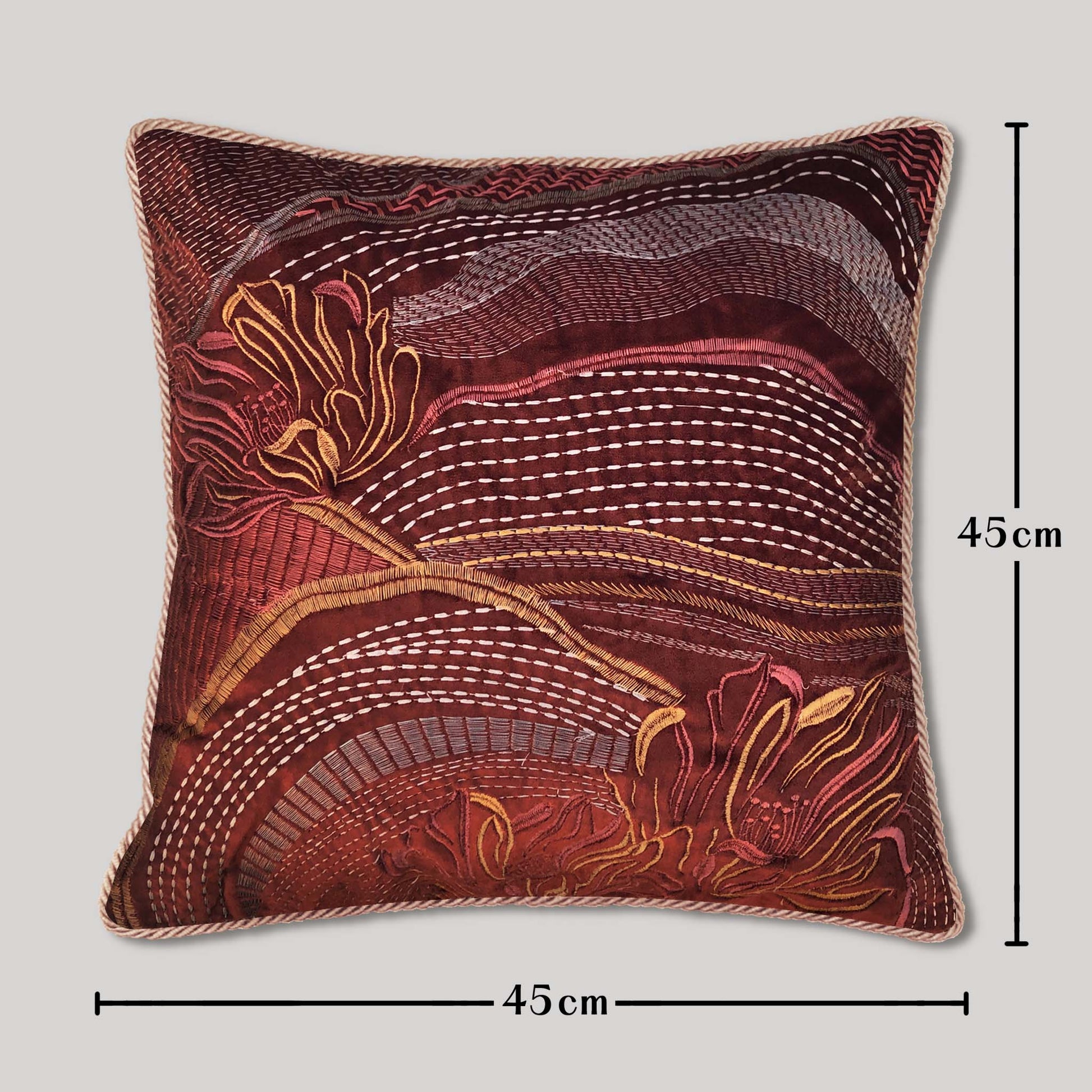 Velvet cushion handmade as an embroidered abstract landscape pillow, a textile art piece designed for bohemian decor and elegant living room styling.