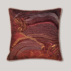 Handmade embroidered pillow cover featuring an abstract landscape floral embroidery on rust velvet, an earth tone bohemian accent pillow for living room home decor.