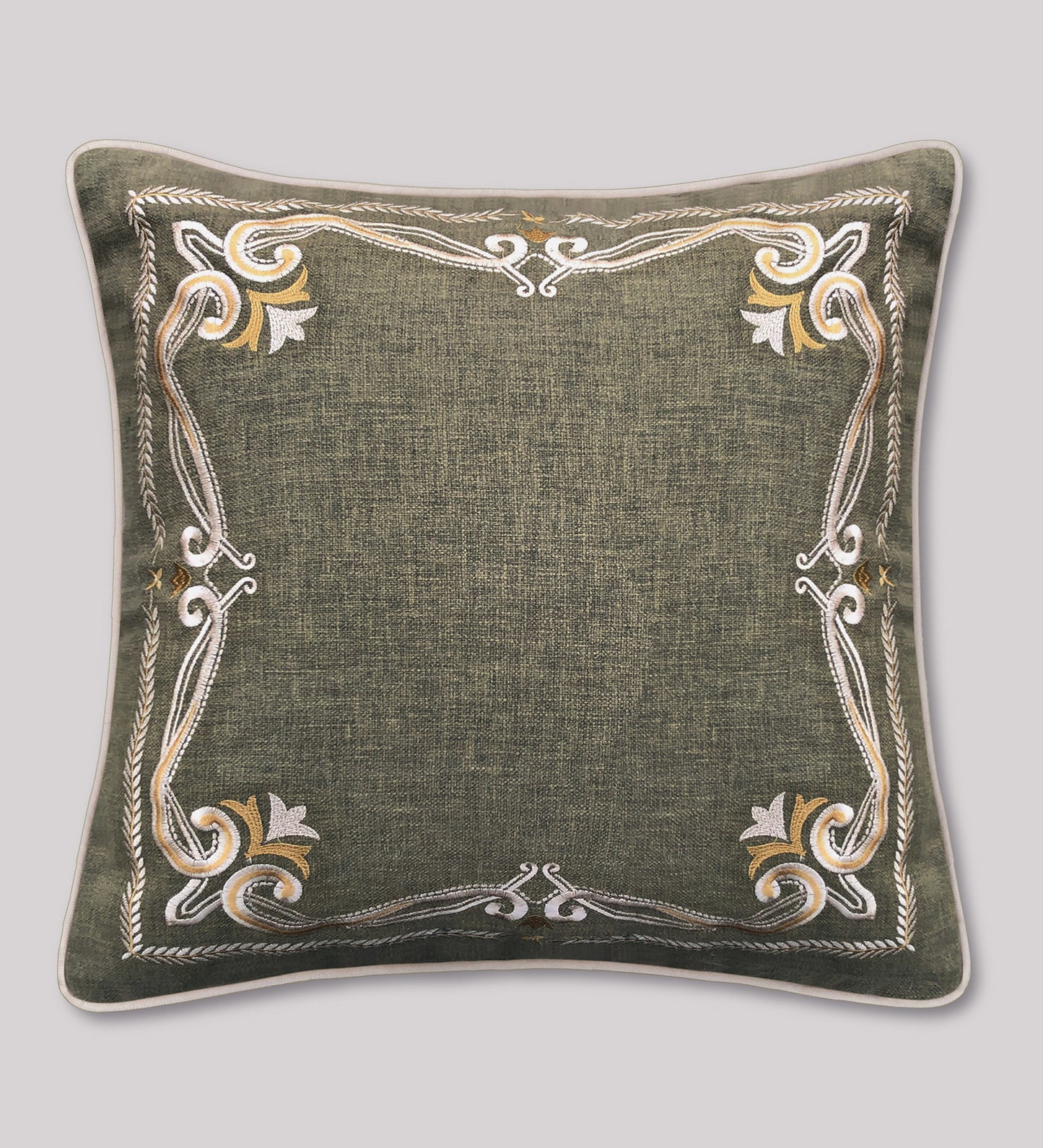 Luxury embroidered cushion cover in green with gold border, perfect for couches, beds, and accent chairs.