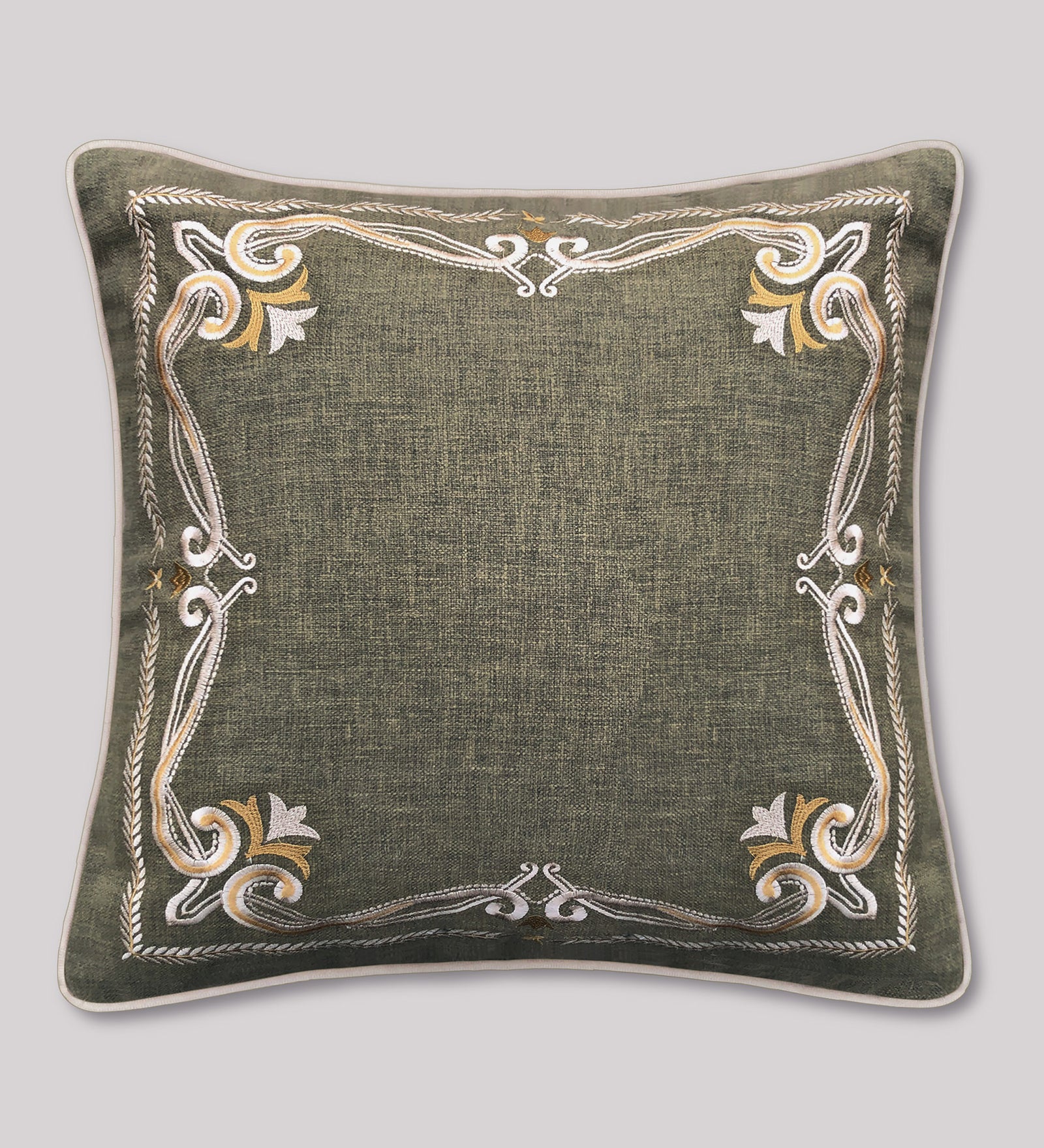 Luxury embroidered cushion cover in green with gold border, perfect for couches, beds, and accent chairs.