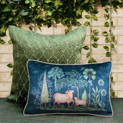 Plush velvet cushion cover with Indian cow and calf motif in deep blue, accented with botanical patterns, elegant luxury home decor piece